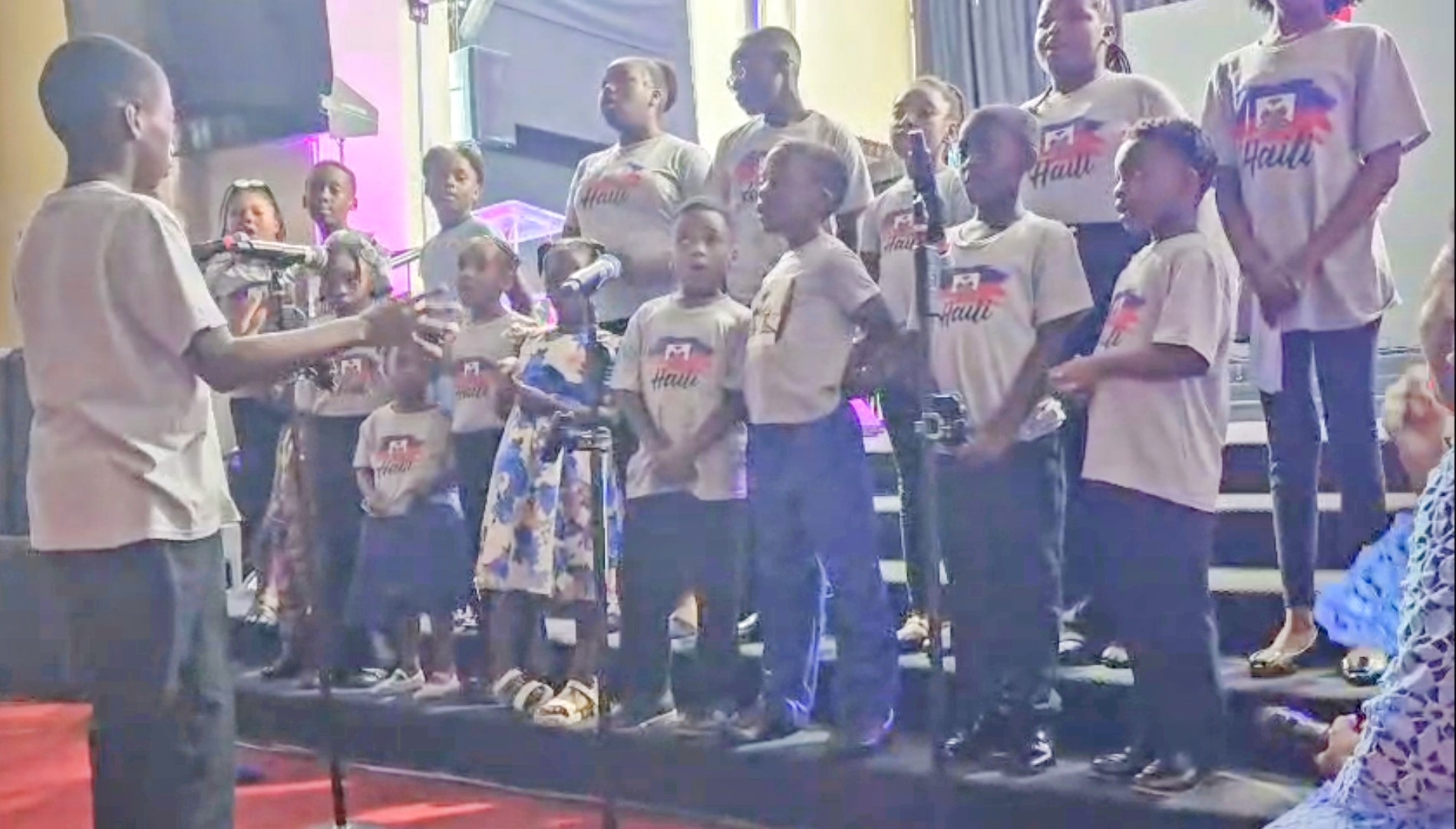 Children performing during the August 2026 concert